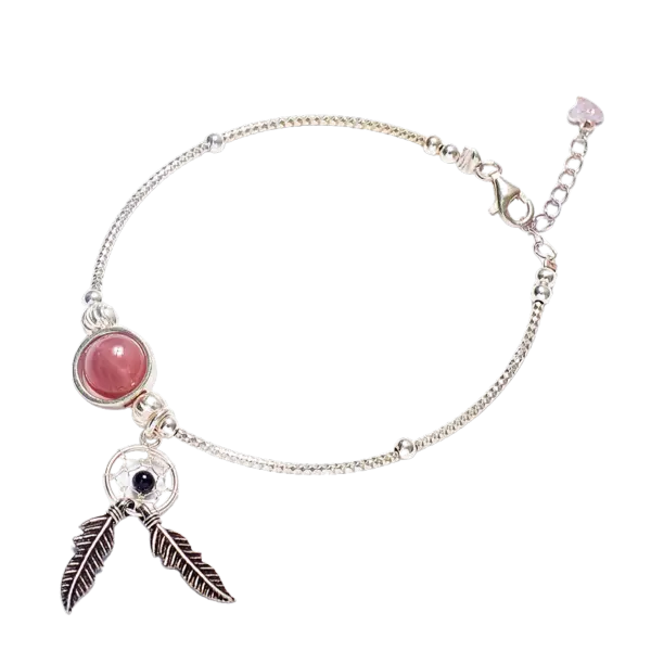 Vòng tay đá Đào Hoa phối chuông gió mix bạc