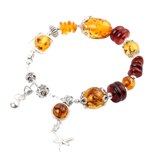 Vòng tay đá hổ phách phối charm bạc chuồn chuồn